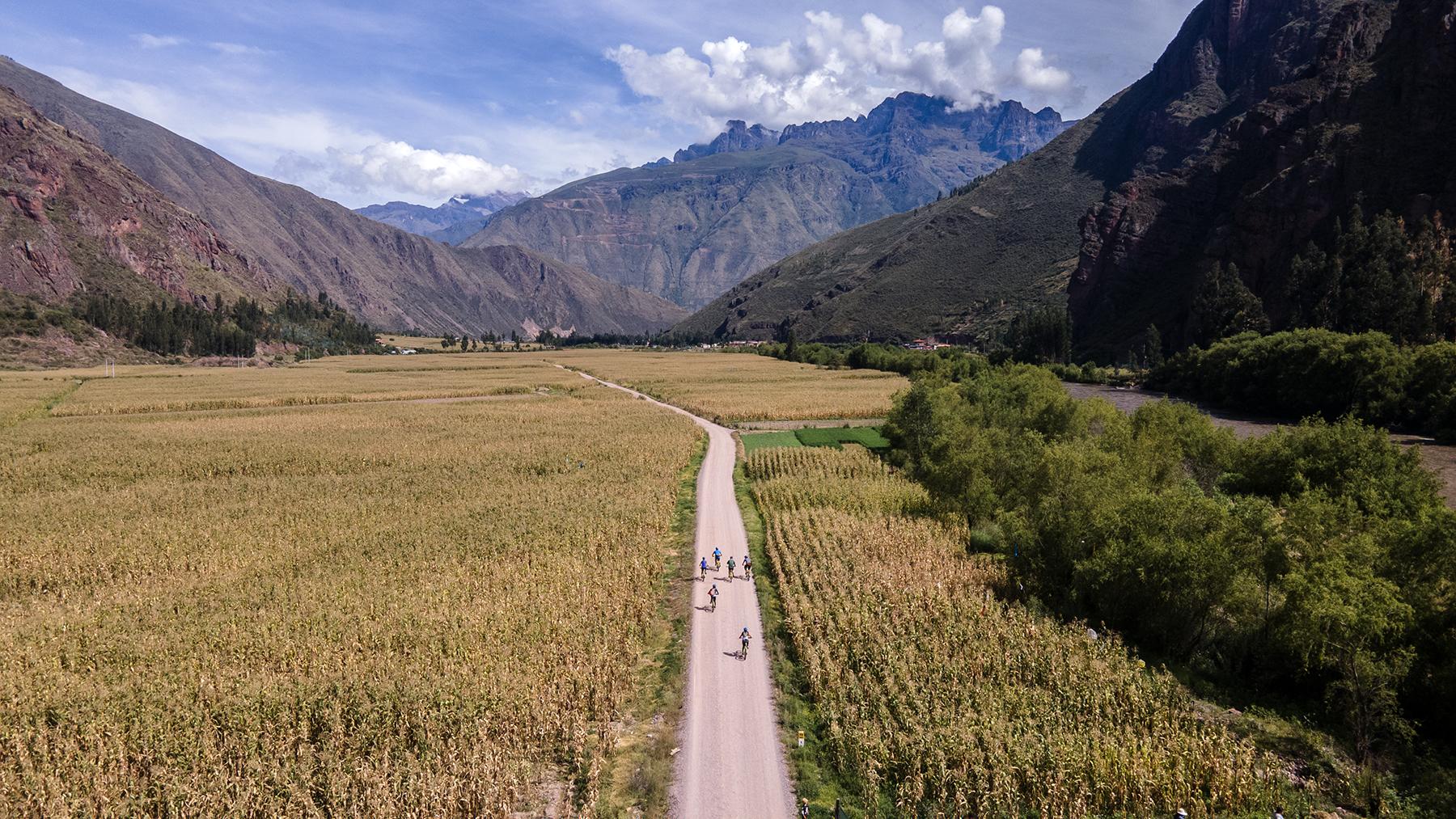 Riders enjoy a private mountain bike tour in Cusco's Sacred Valley. The riders cycle along the Sacred Valley Bike Corridor on rental bikes available from a bike shop in Lamay
