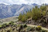 Riders participate in a sacred valley ebike tour, climbing from the El Bike Project bike shop in the town of Lamay to the neighboring community of Huayllafara